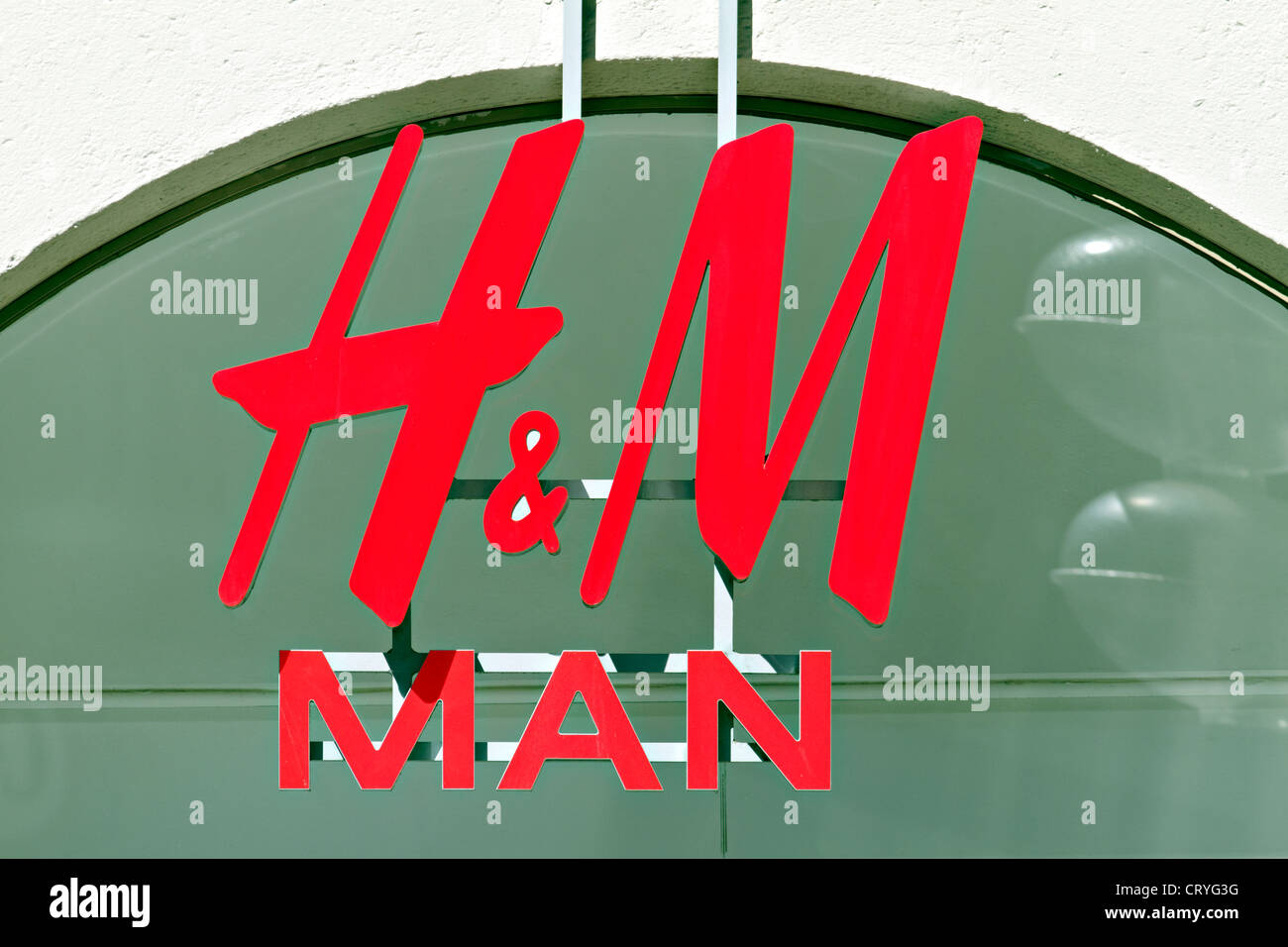 H & M German fashion shop sign Stock Photo Alamy