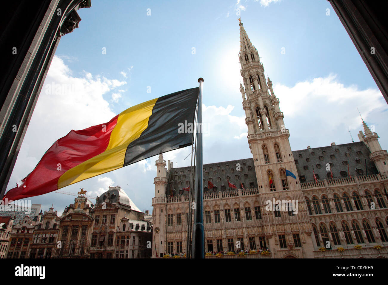 Belgium, Brussels, Grand Place, Town Hall with Belgian flag Stock Photo