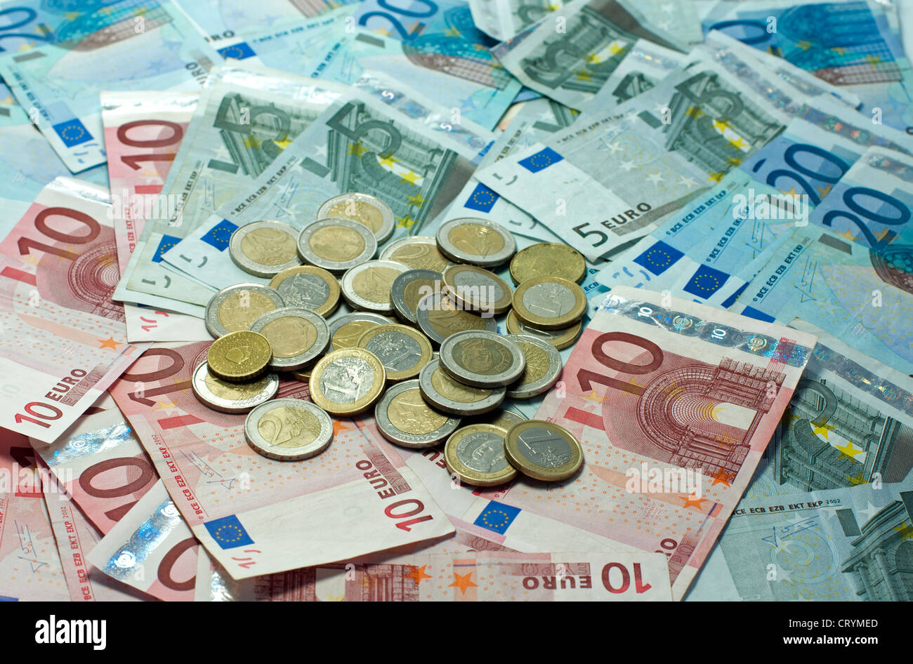 euro money paper and coins on ioalted white Stock Photo
