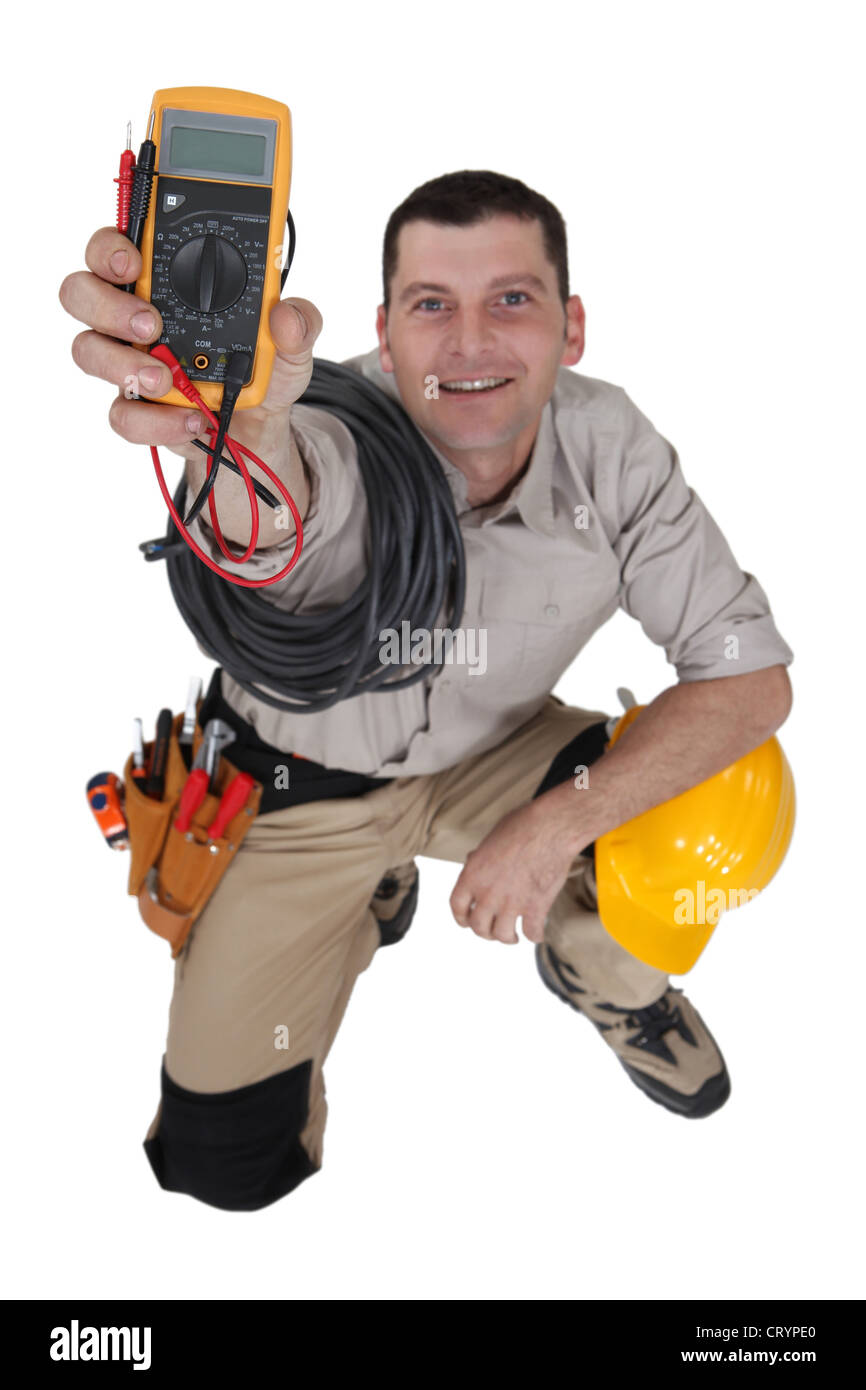 electrician holding a measurement tool Stock Photo Alamy