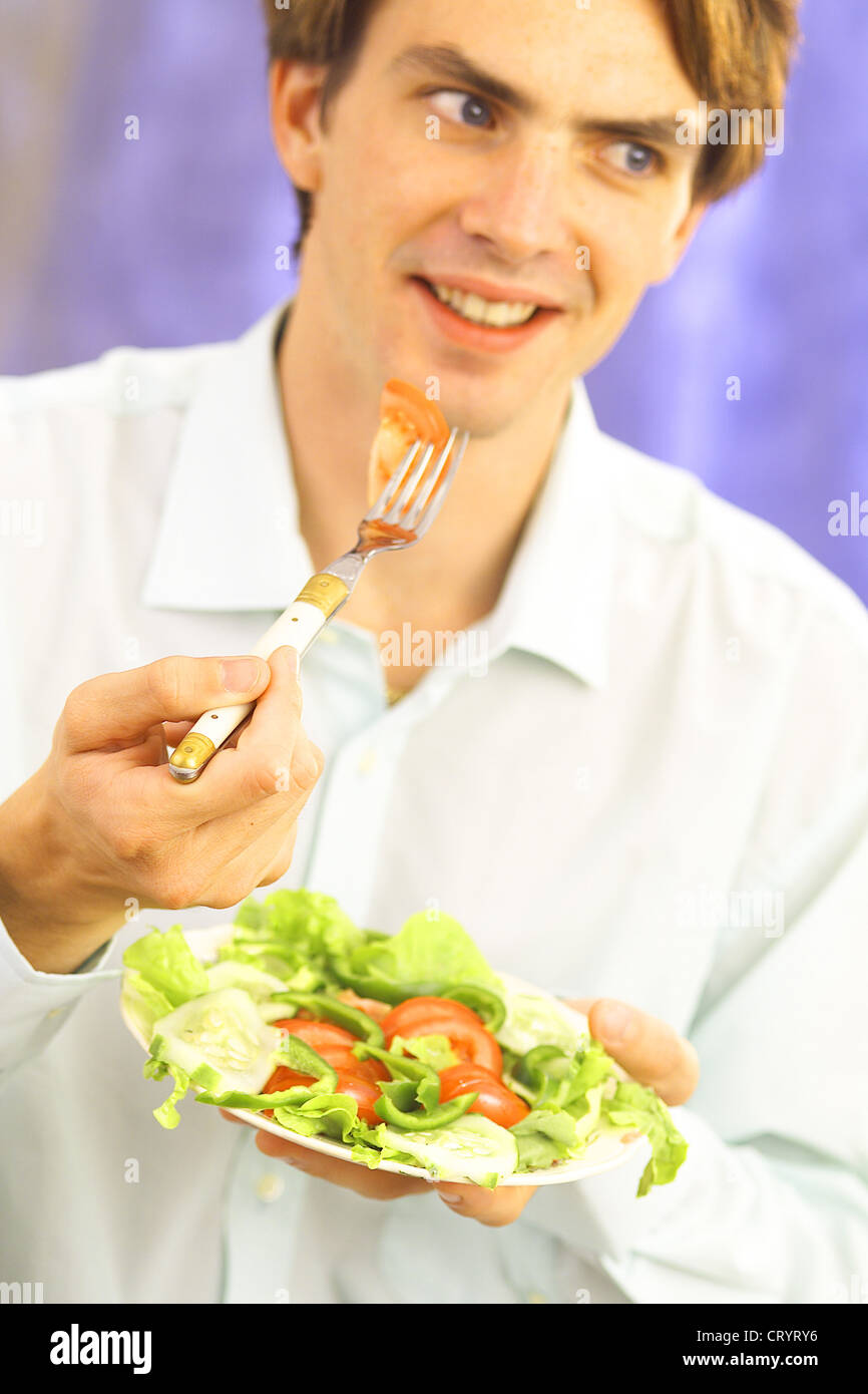 MAN EATING SALAD Stock Photo Alamy