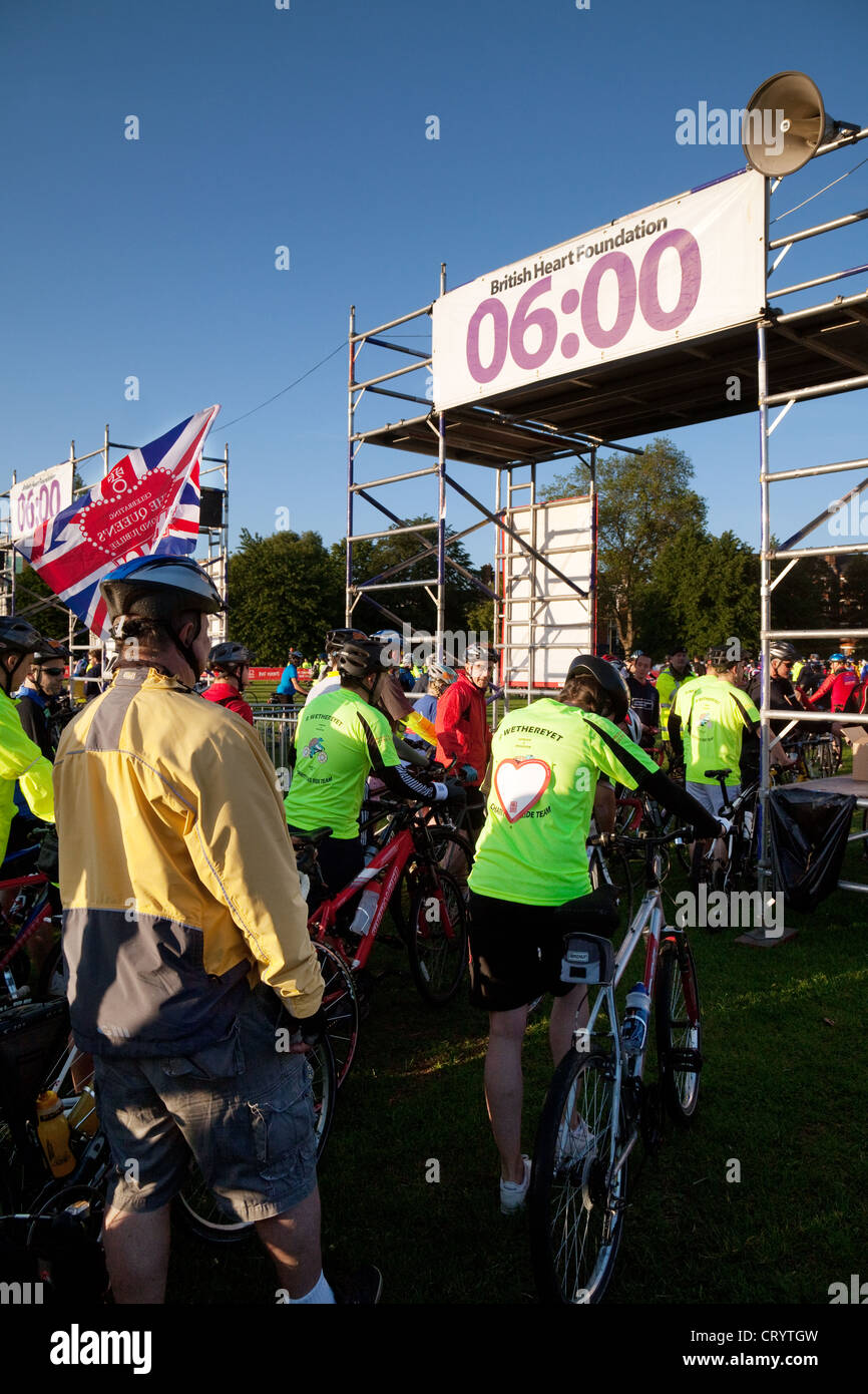Riders gather in Clapham Common at 06.00 for the start of the charity London to brighton cycle ride, UK Stock Photo