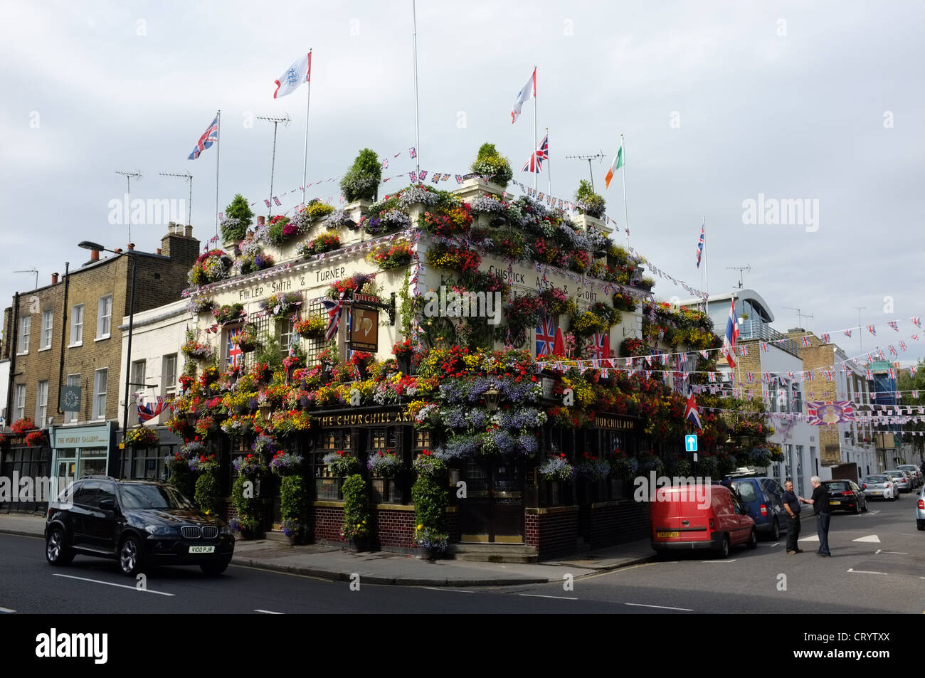 A floral display at the Churchill Arms Pub, Kensington Church Street, London W8 7LN Stock Photo