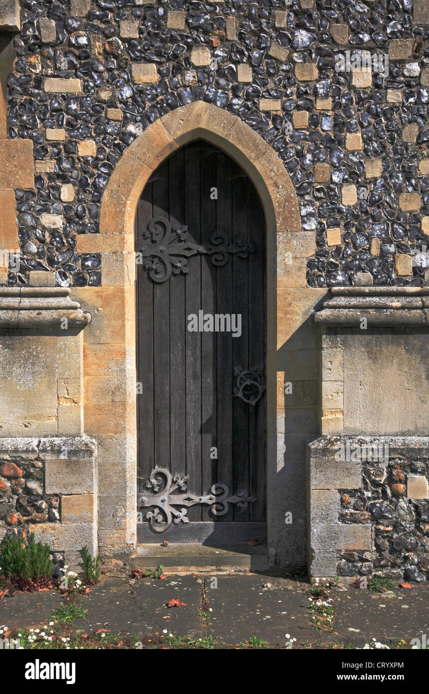 A view of an old chancel door in the parish Church of St Martin at New Buckenham, Norfolk, England, United Kingdom. Stock Photo