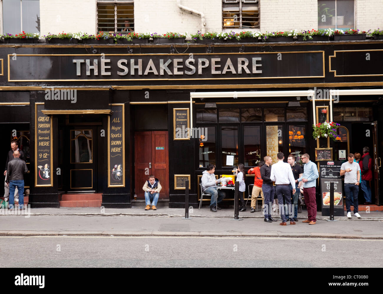 People outside the Shakespeare Pub, Victoria, London UK Stock Photo