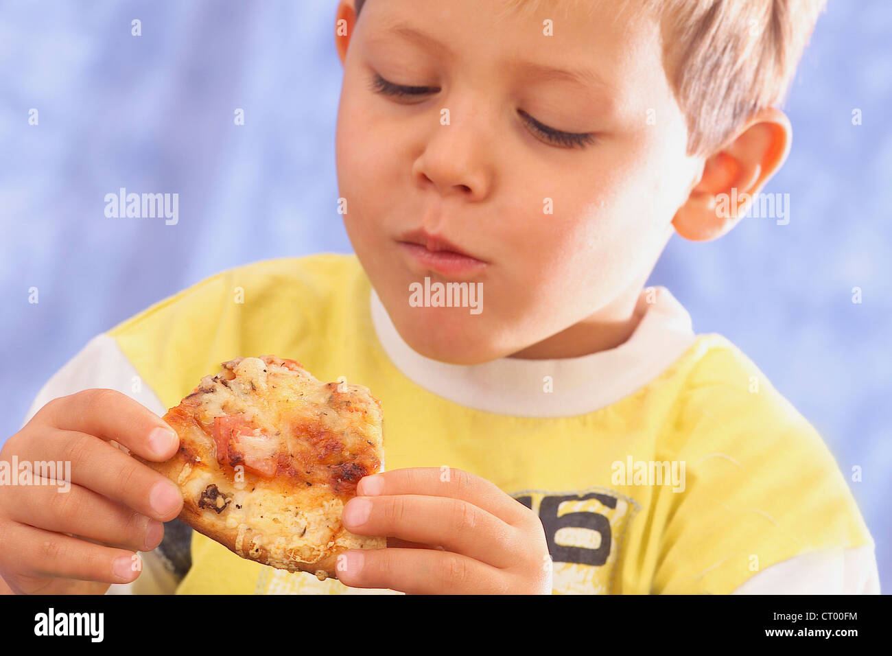 Pizza junk food boy child hi-res stock photography and images - Alamy