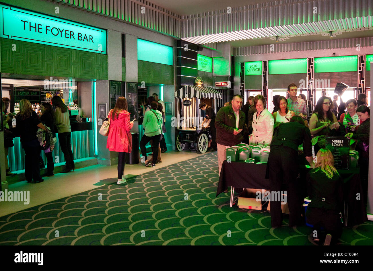 People in the theatre lobby for  west end Musical 'Wicked' at the Apollo Victoria theatre, London UK Stock Photo