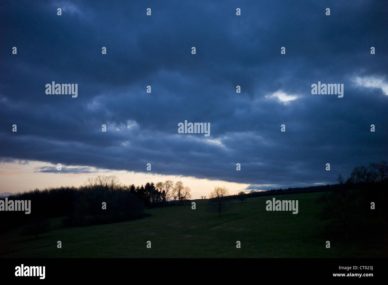 Rainstorm weather front above Swinbrook in the Cotswolds, Oxfordshire, UK Stock Photo