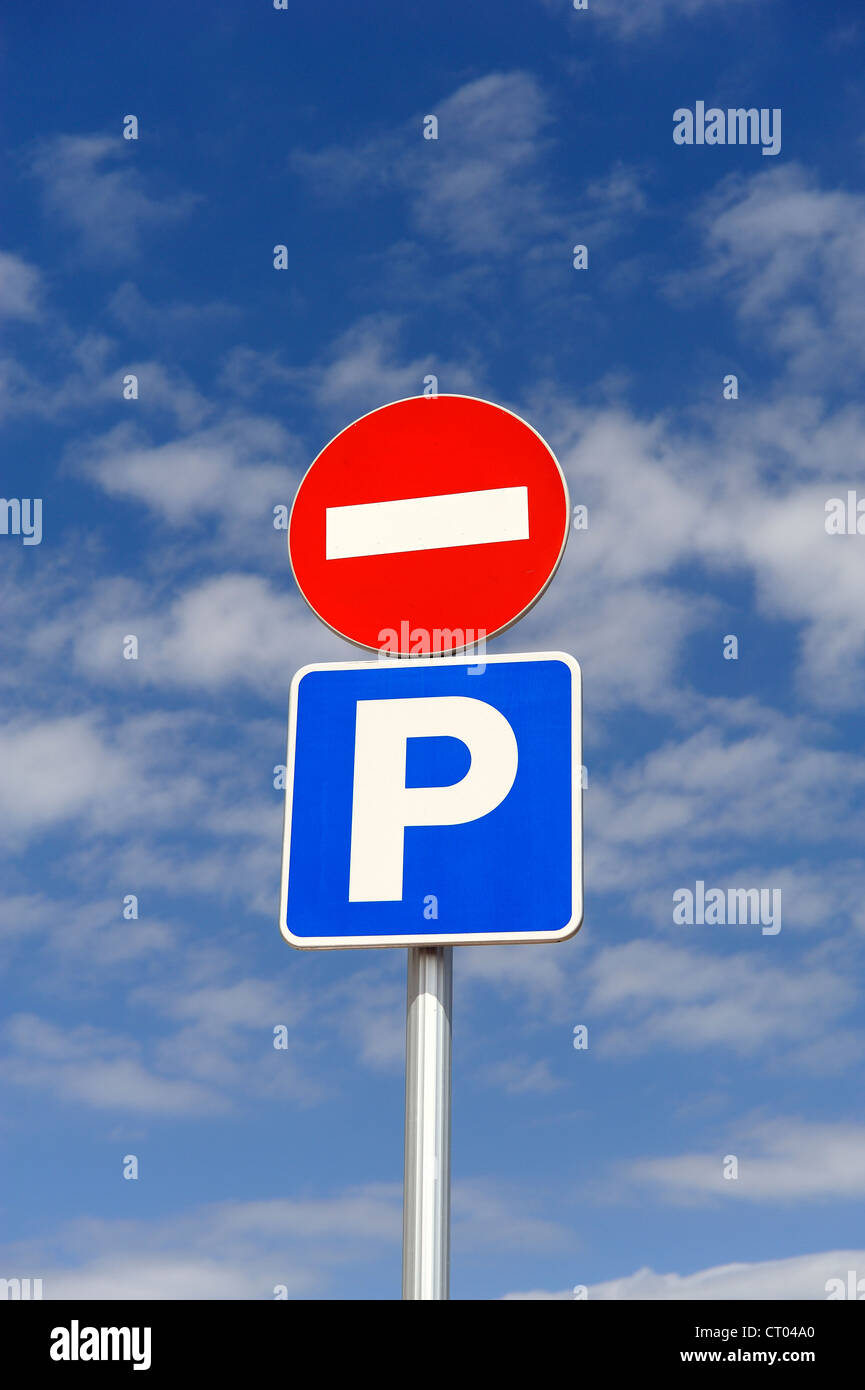 no entry sign to a car park against a blue sky Stock Photo - Alamy