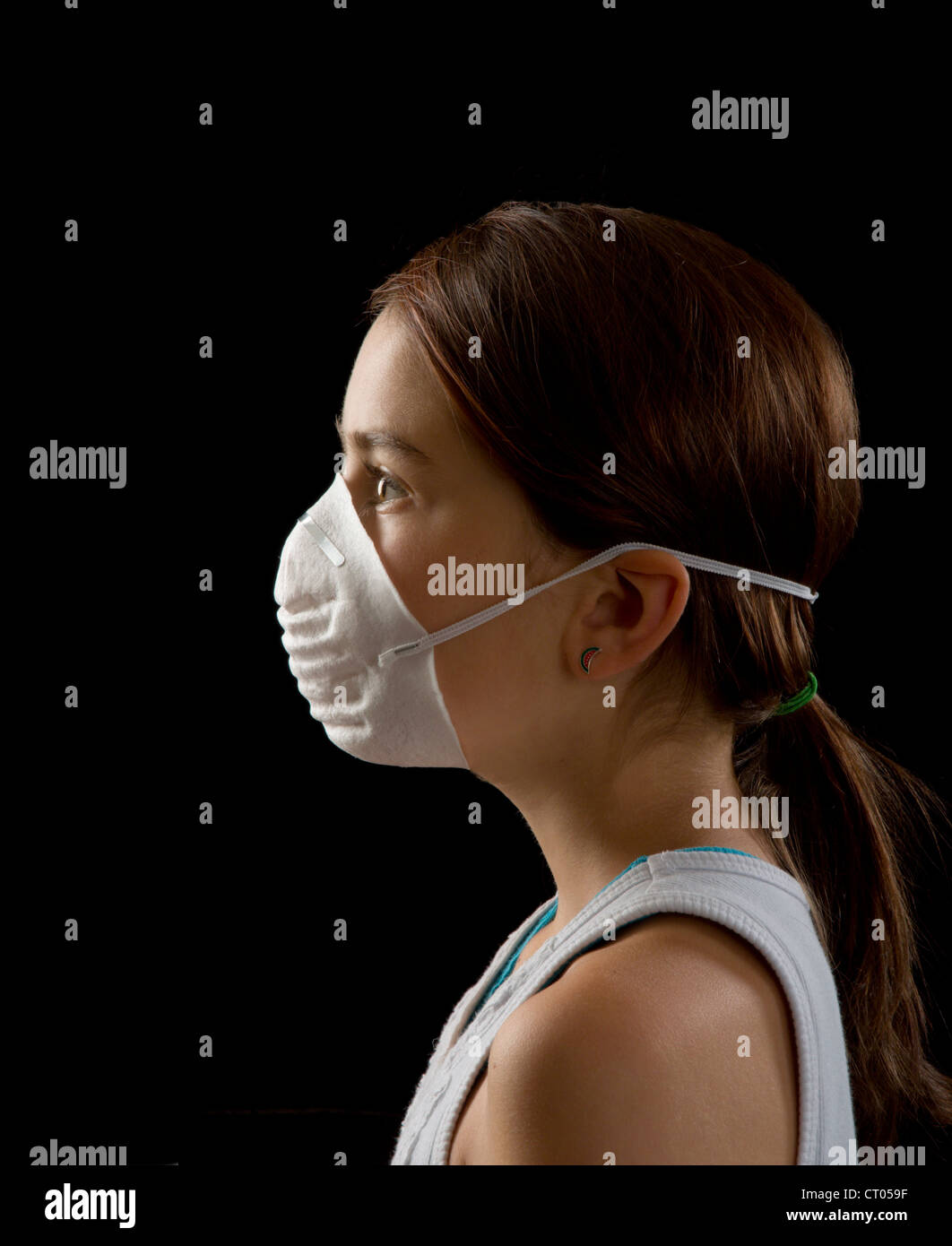 Dust mask on face of young girl Stock Photo 49176667 Alamy