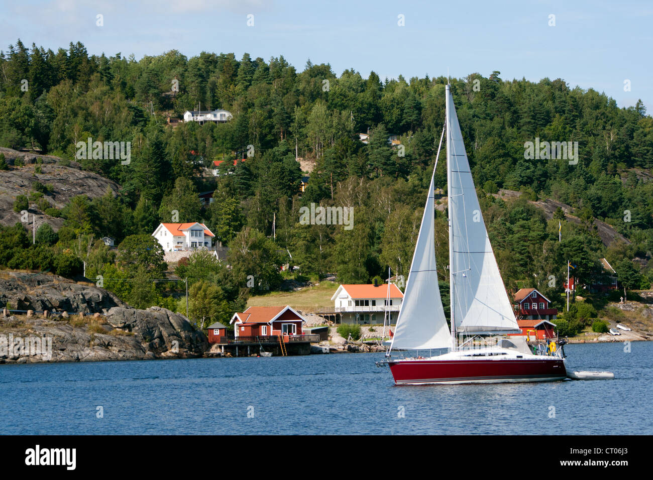 Sail yacht on a lake in Sweden Stock Photo