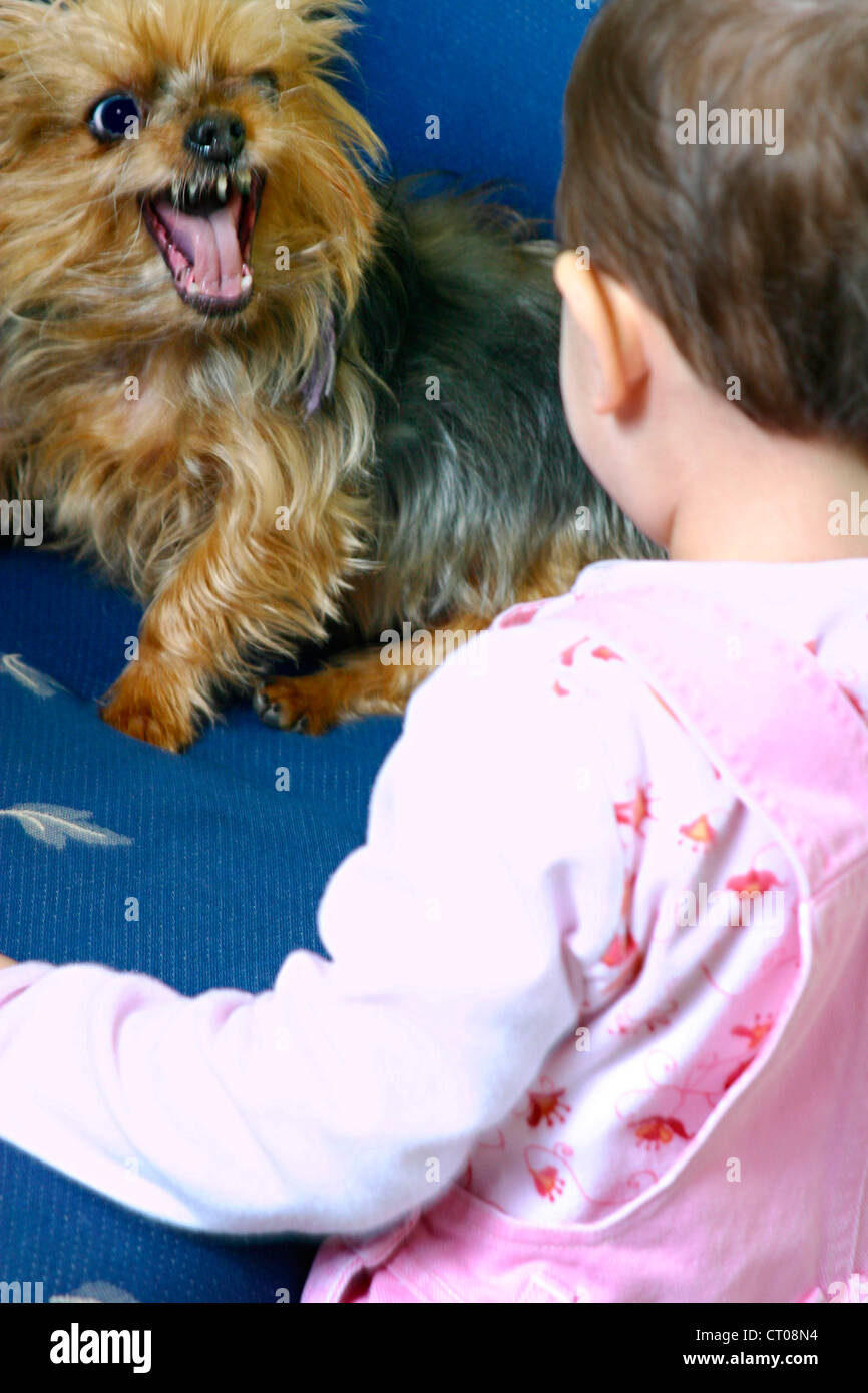 INFANT WITH ANIMAL Stock Photo Alamy