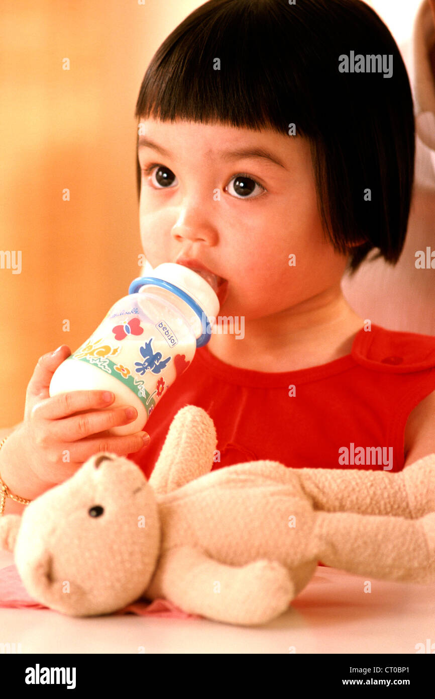 CHILD WITH BABY BOTTLE Stock Photo Alamy