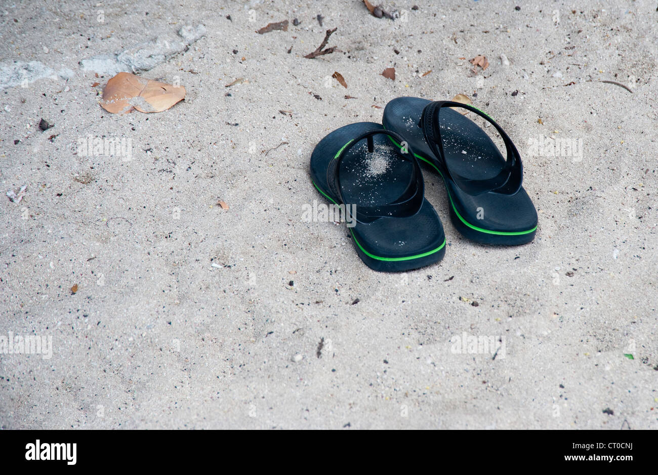 Flip flops on Caribbean beach Stock Photo - Alamy
