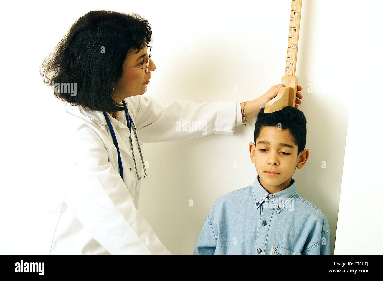 MEASURING HEIGHT IN A CHILD Stock Photo Alamy