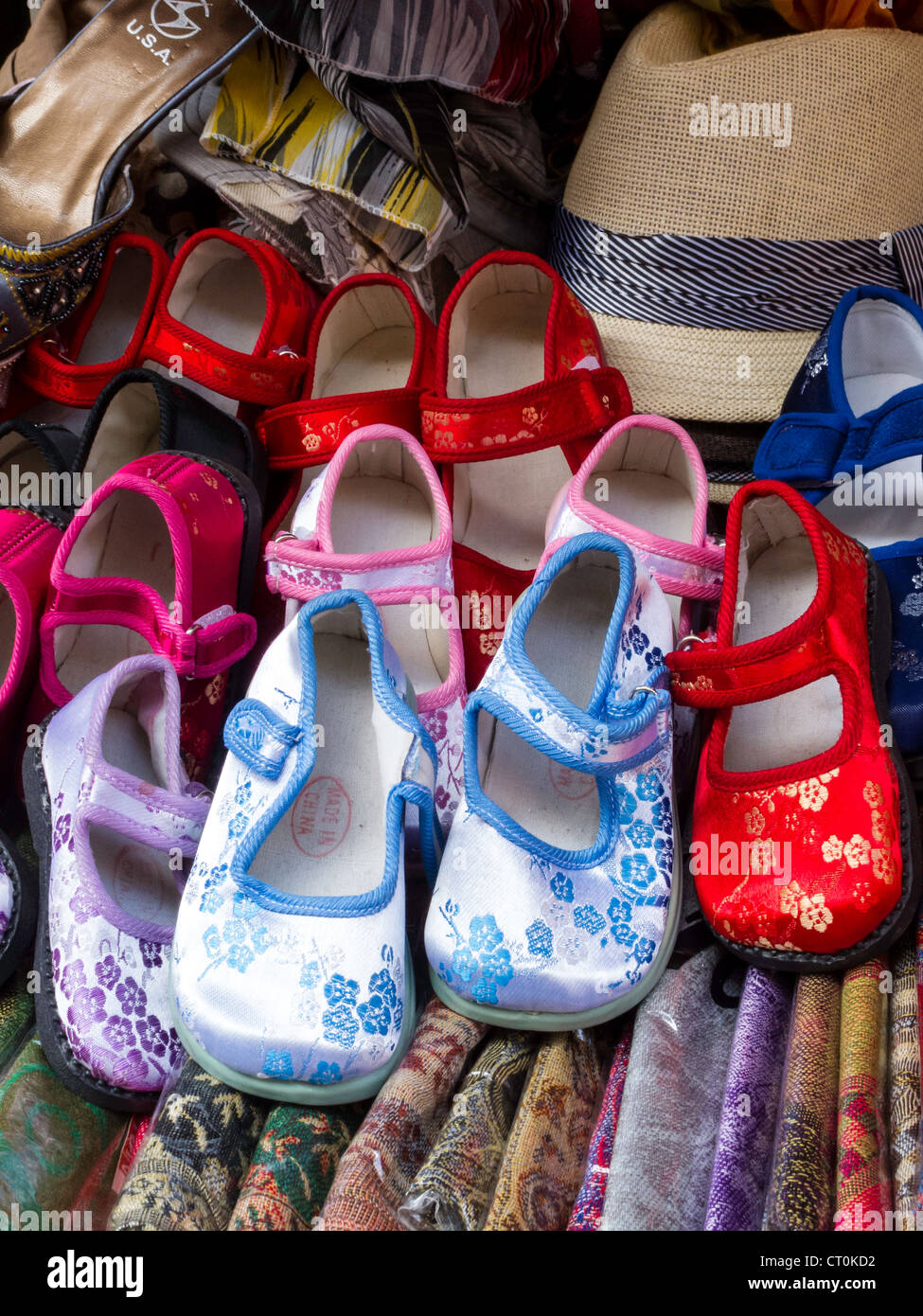 Shoes for sale in chinatown hi-res stock photography and images - Alamy