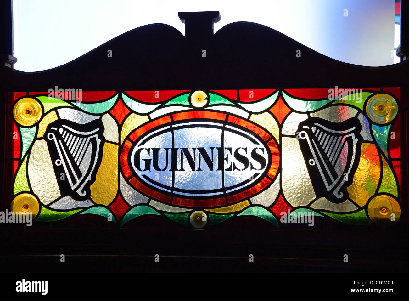 'Guinness' stained-glass window in Irish pub, Cannes, Côte d'Azur, Alpes-Maritimes, Provence-Alpes-Côte d'Azur, France Stock Photo