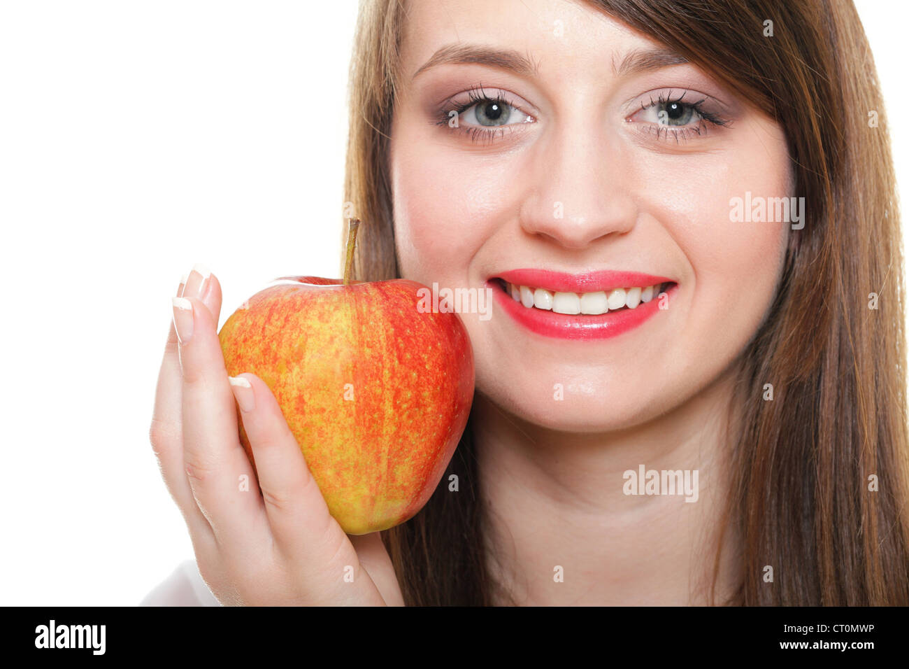 Young smiling woman with fruits and vegetables. Over white background ...