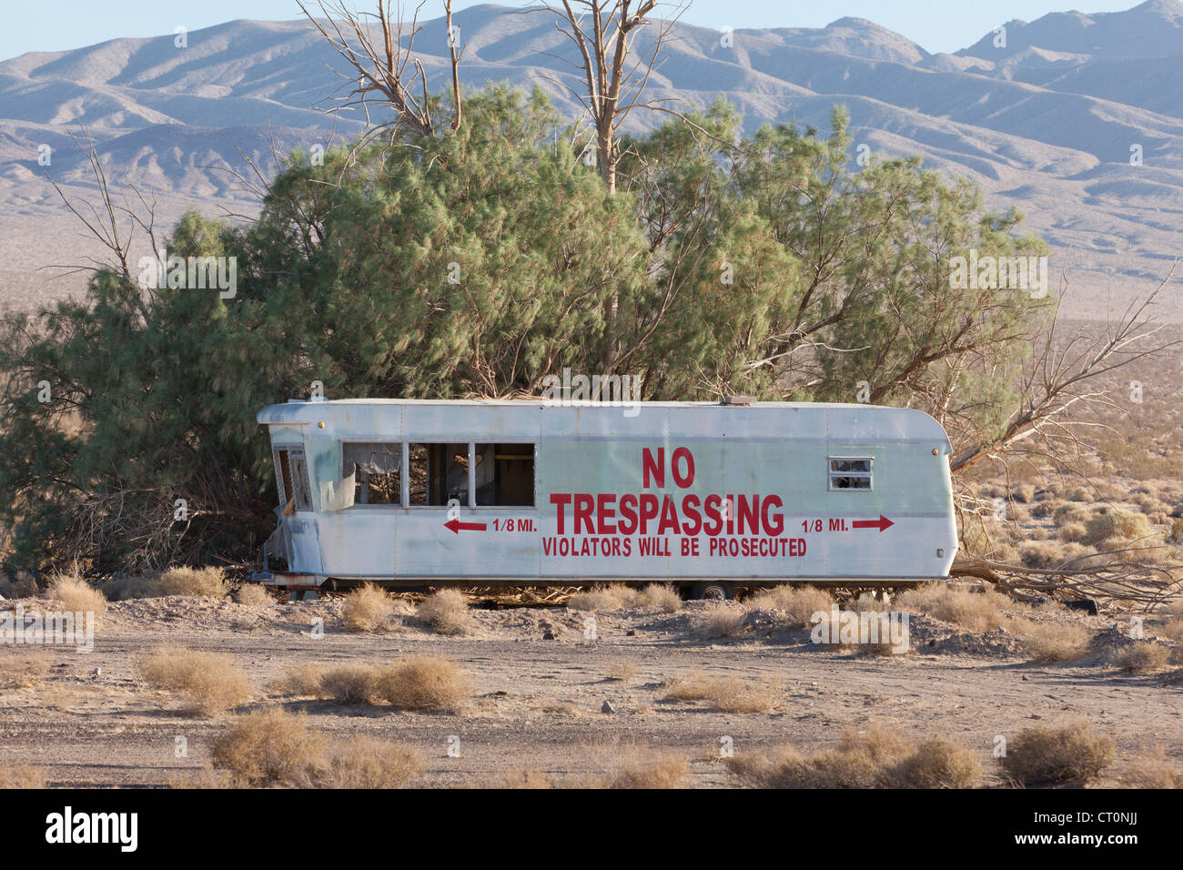No Trespassing warning on trailer home Stock Photo