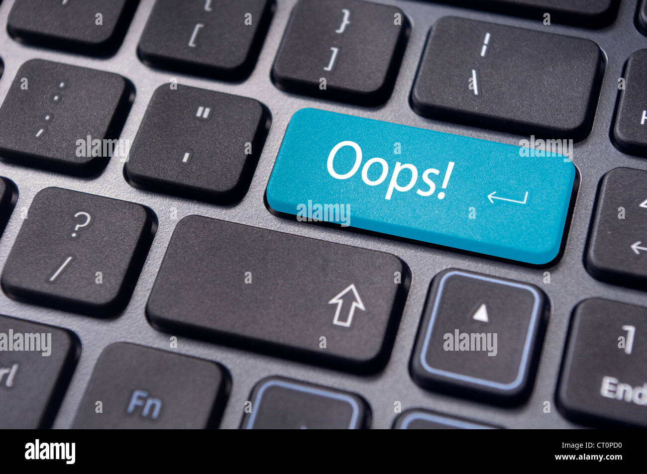 mistake concepts, with oops message on keyboard. Stock Photo