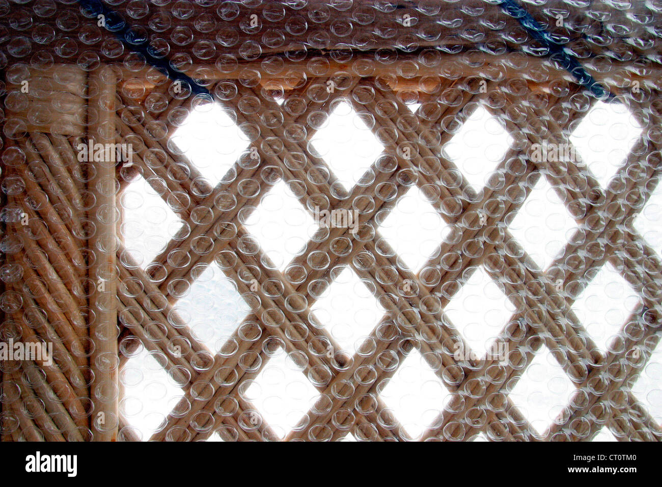 Rattan furniture with bubble wrap packed in a Moebelwagen Stock Photo