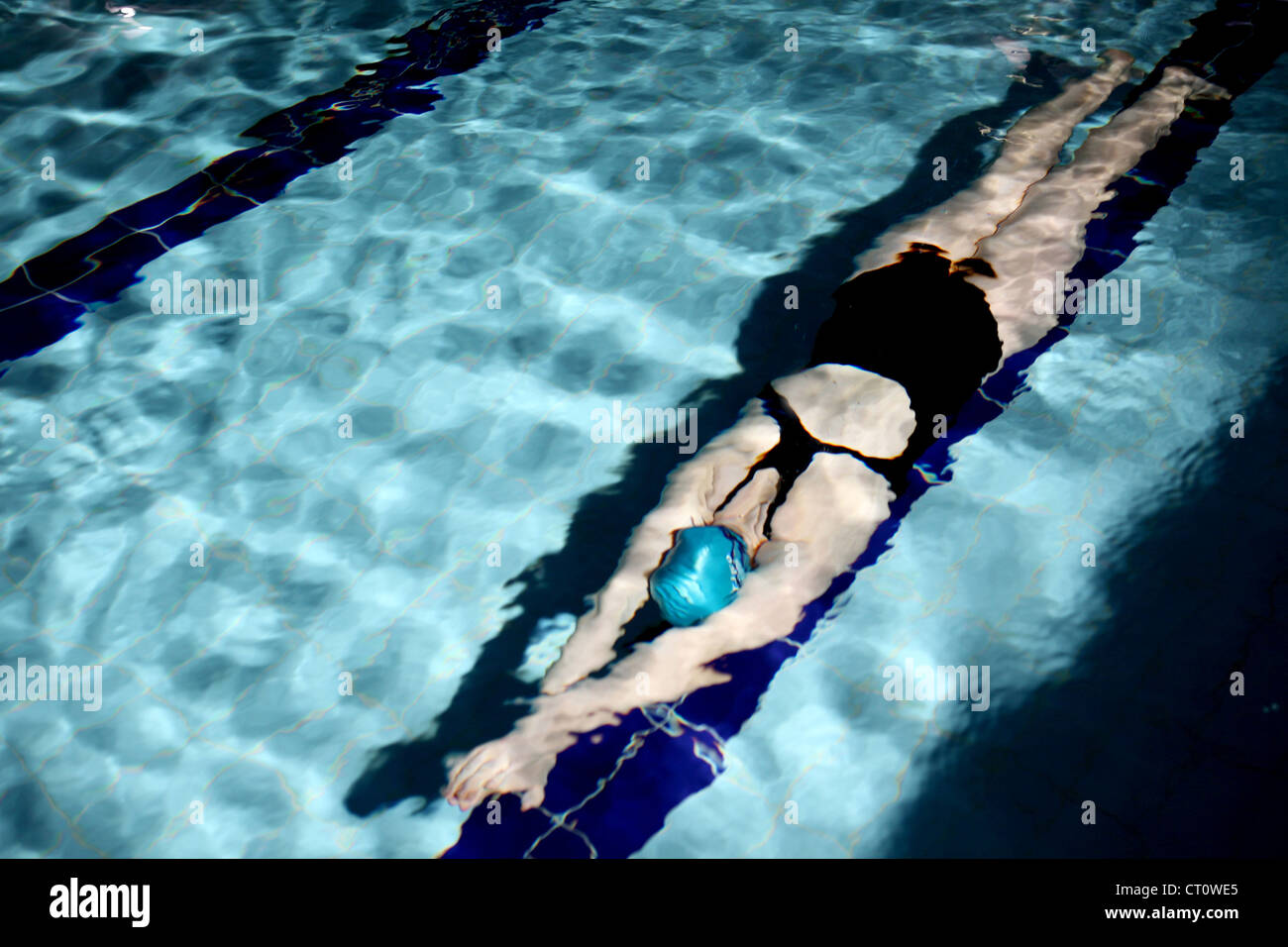 Swimmer doing laps in pool Stock Photo Alamy