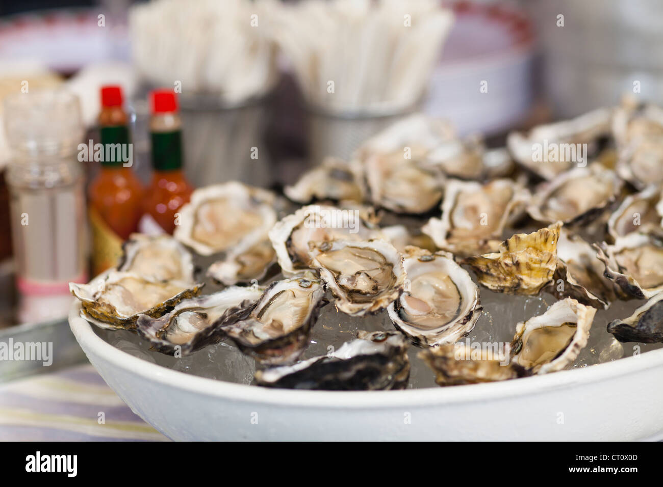 Close up of bowl of oysters Stock Photo