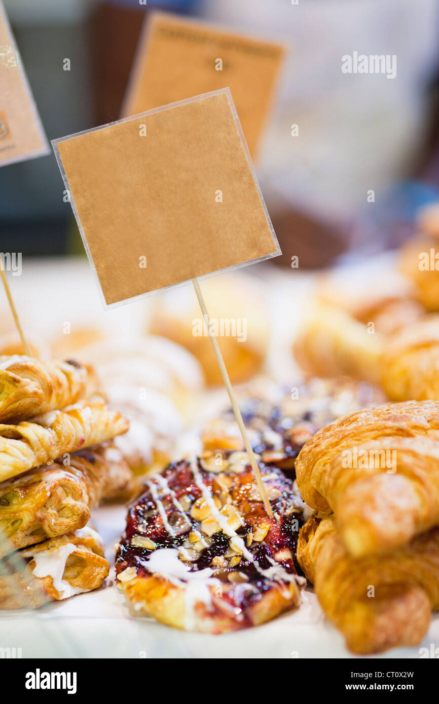 Stacks of fresh pastries for sale Stock Photo Alamy
