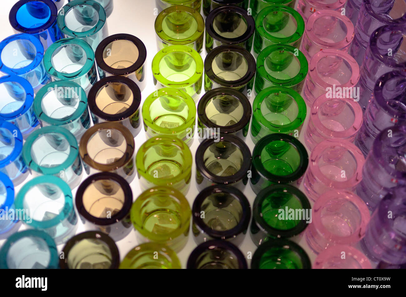 Display of coloured glass tumblers Stock Photo Alamy