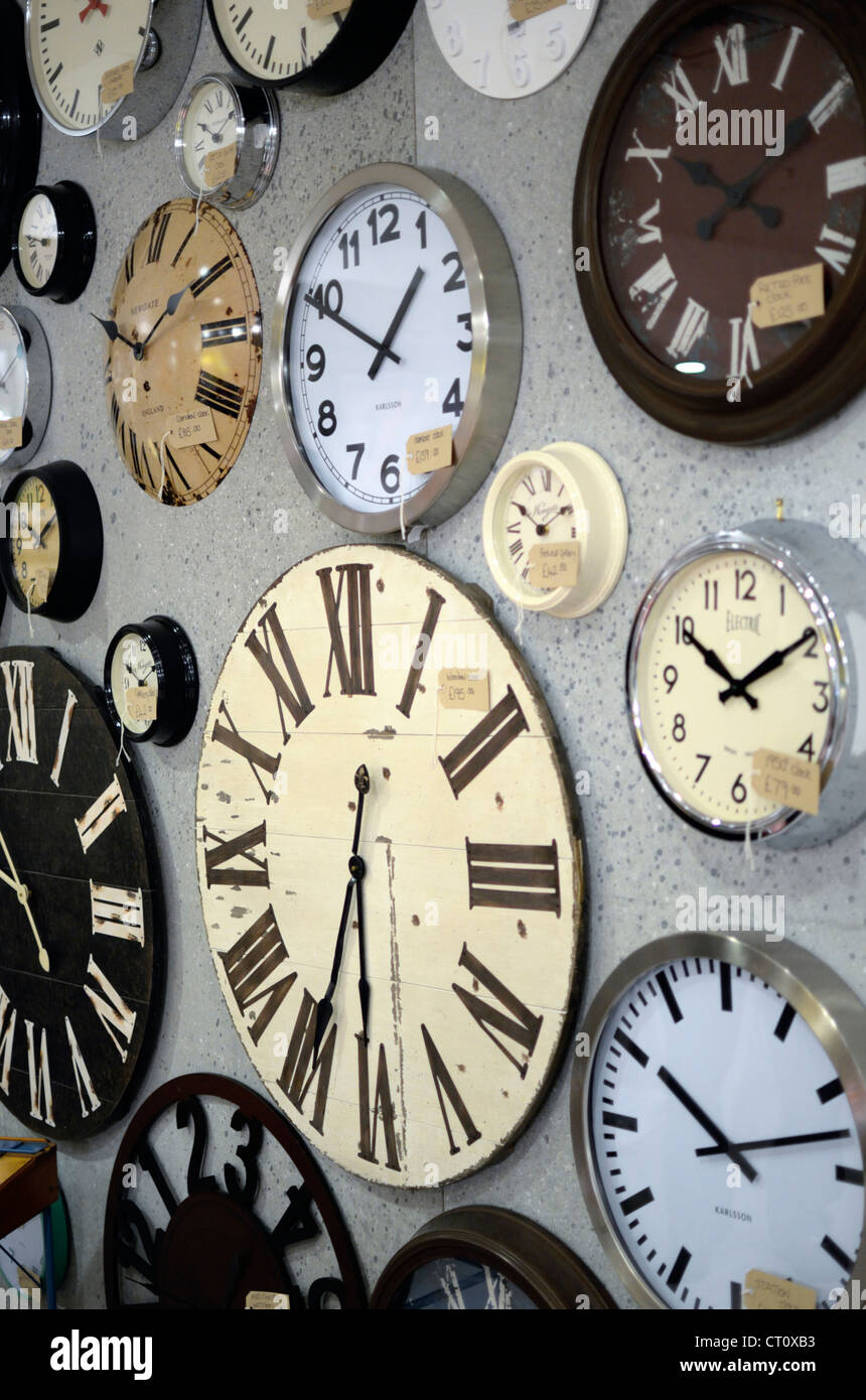 Clocks on display in a department store Stock Photo