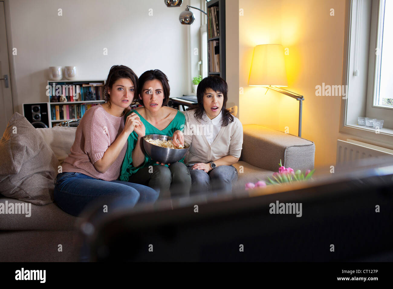 Women Watching Scary Movie Together Stock Photo 49196218