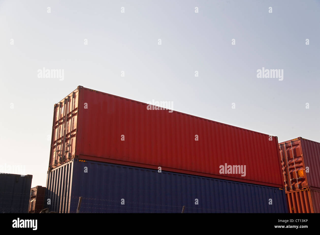 Low angle view of stacked containers Stock Photo