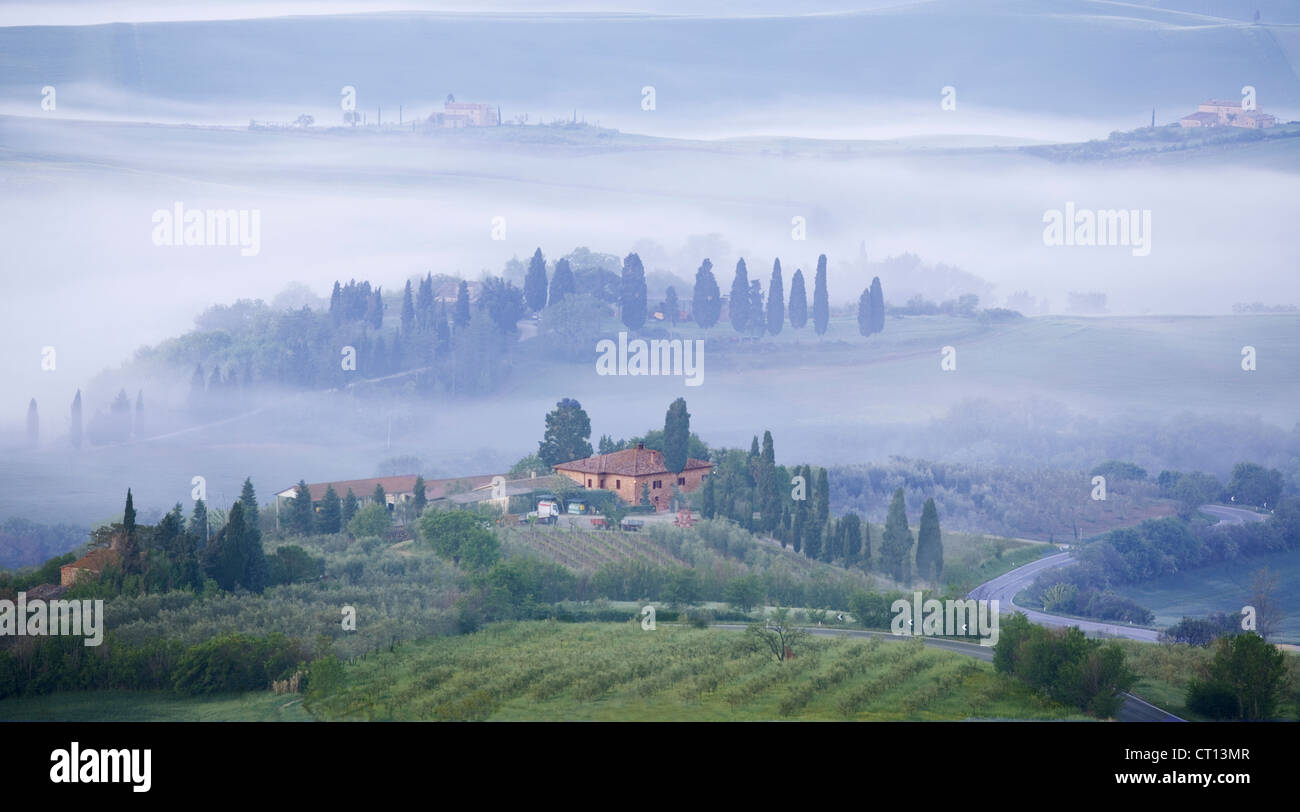Pienza - misty early morning view across Val d'Orcia Stock Photo