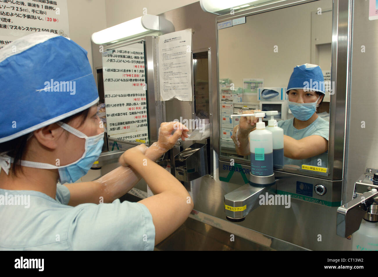 A surgeon scrubbing up before an operation Stock Photo Alamy
