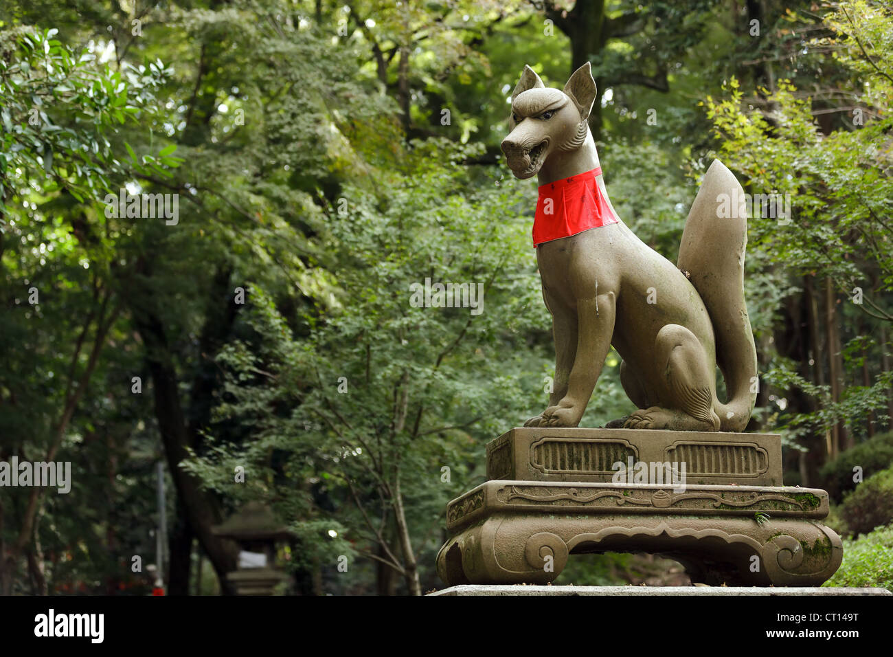 god fox statue in fushimi inari shrine near Kyoto, Japan ...