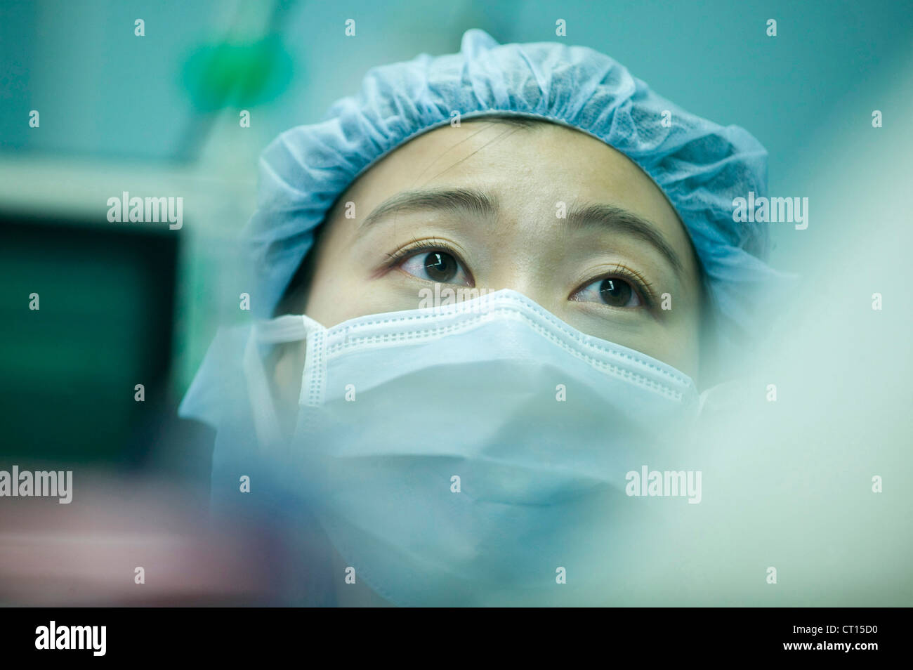 A close-up of a surgeon at work. Stock Photo