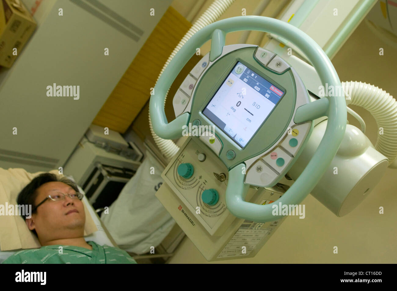 A patient is prepared for an x-ray. Stock Photo