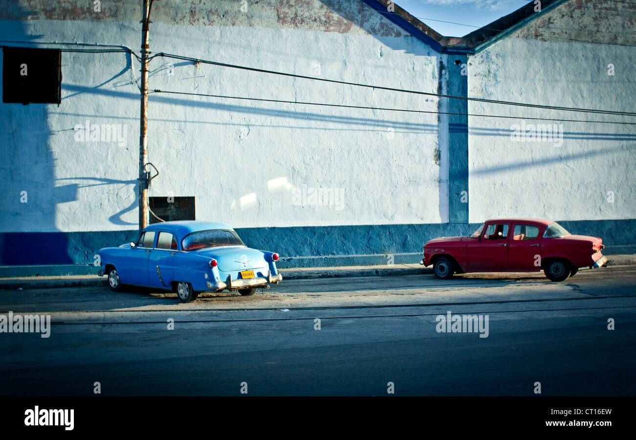 Vintage cars parked on city street Stock Photo - Alamy