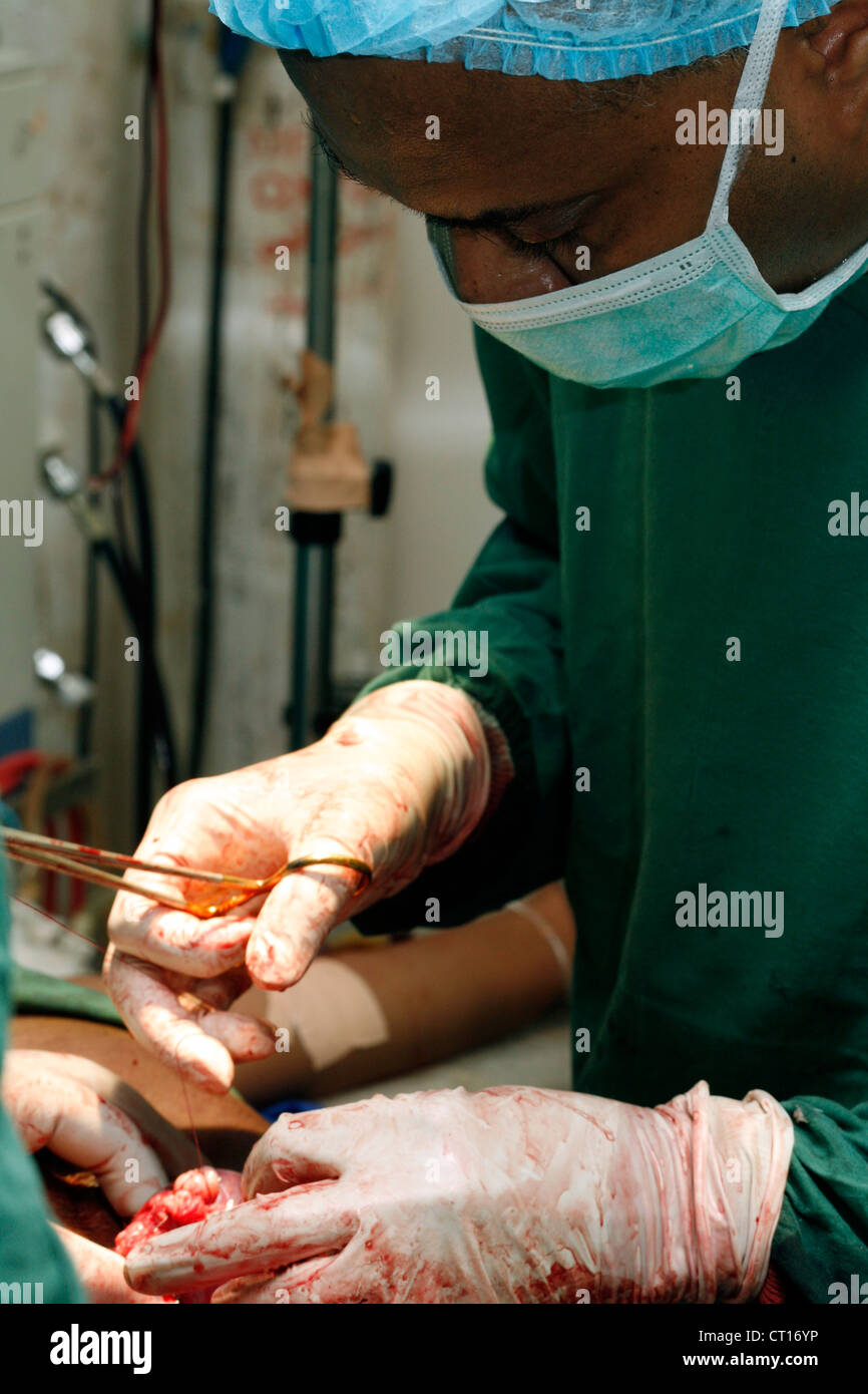 Surgeon performing a Cesarean Section Stock Photo