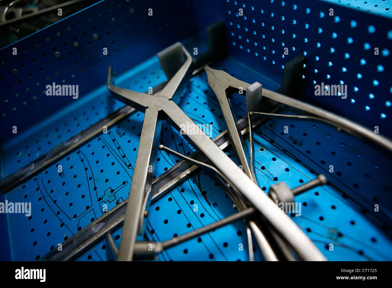 Various surgical hand tools in crate. Stock Photo