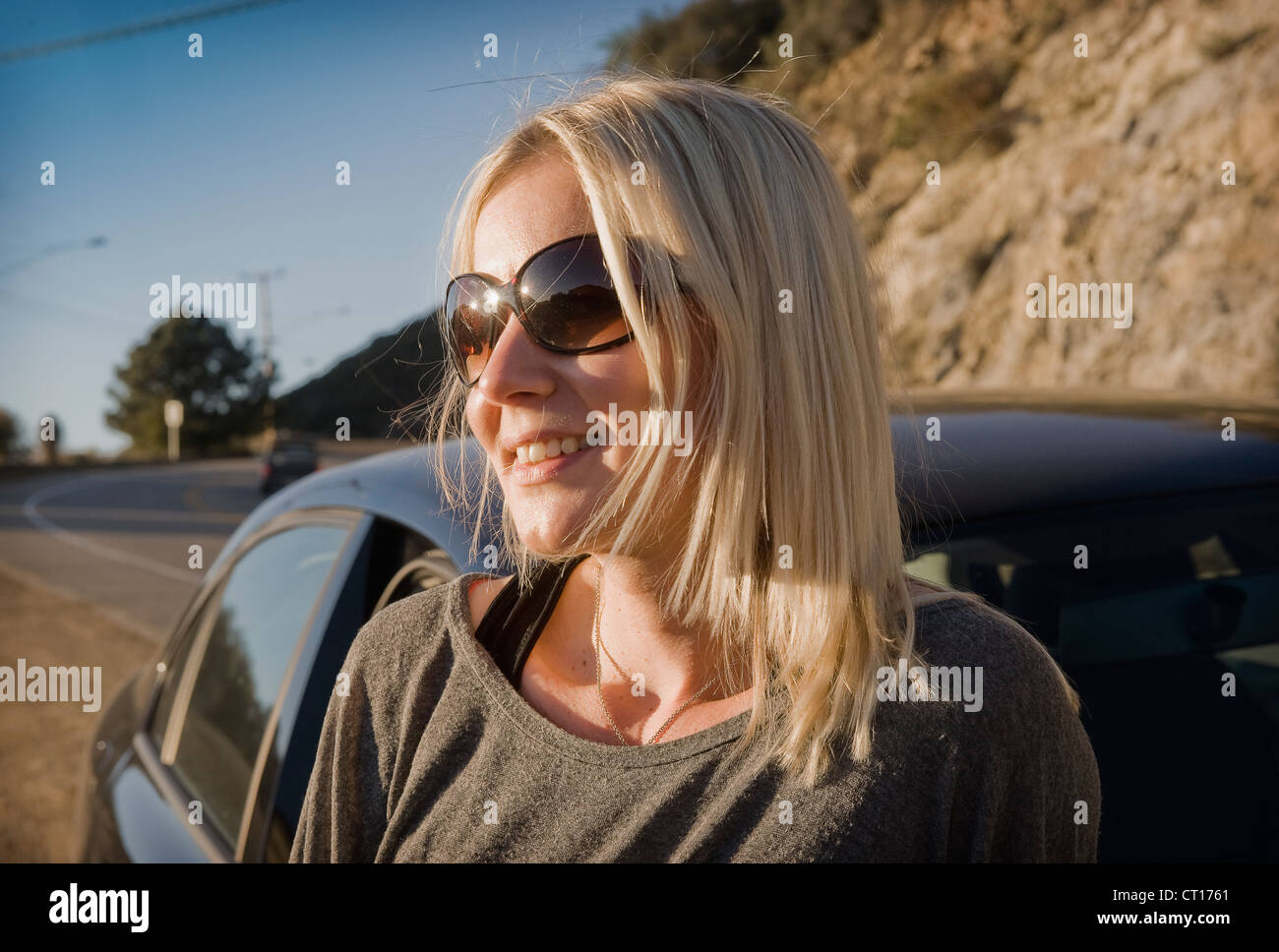Close up of woman wearing sunglasses Stock Photo