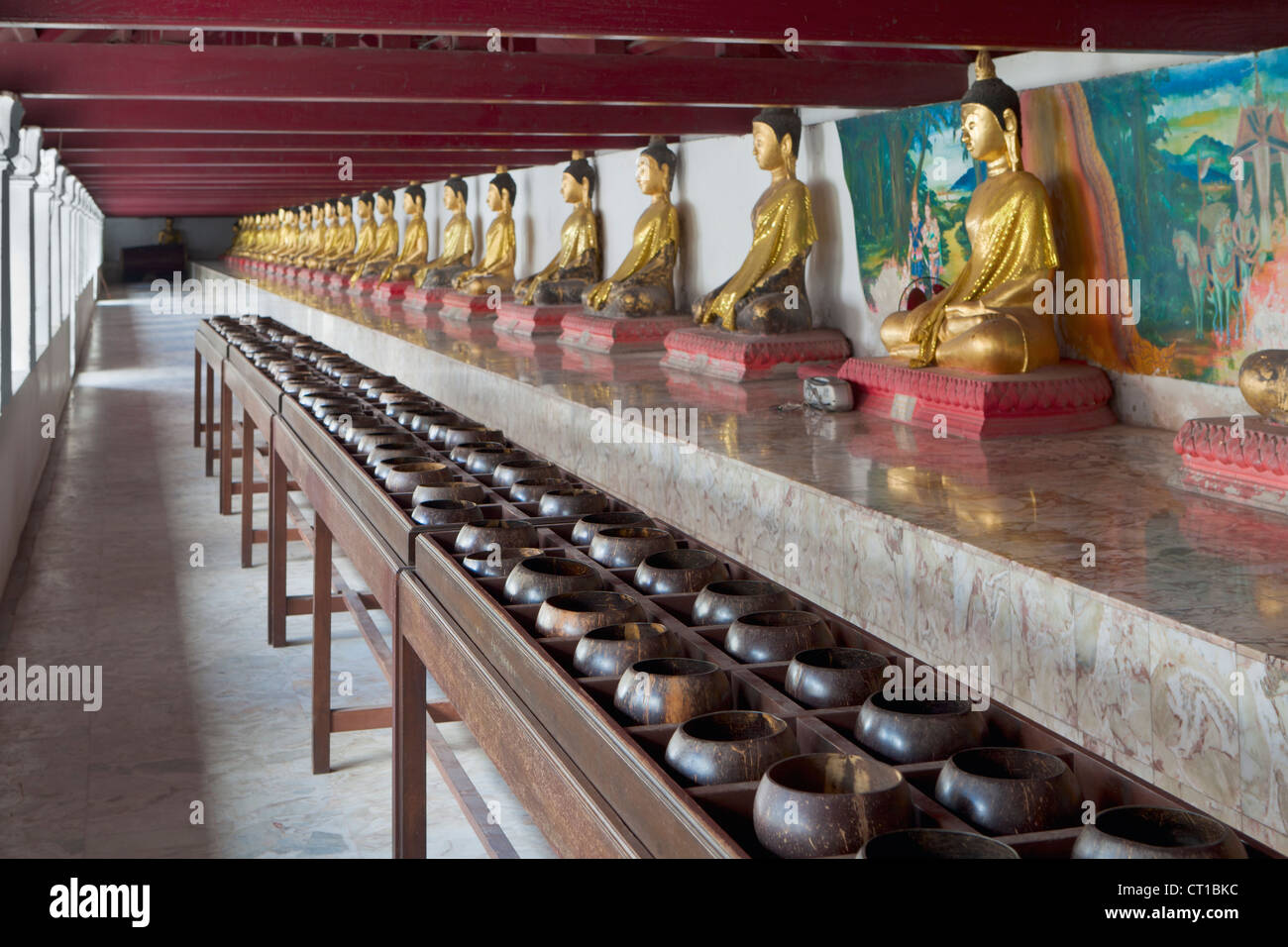 Wooden bowls for merit making at Wat Phra Mahathat Woramahawihaan temple, Nakhon Si Thammarat, Thailand Stock Photo