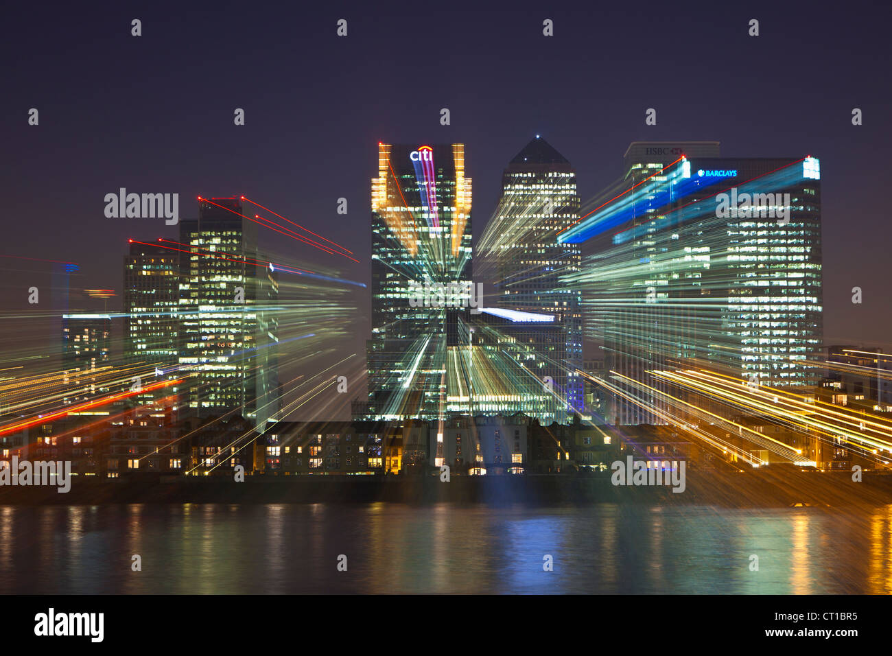 Canary Wharf financial district viewed over the river Thames with a zoom burst effect, London, UK Stock Photo