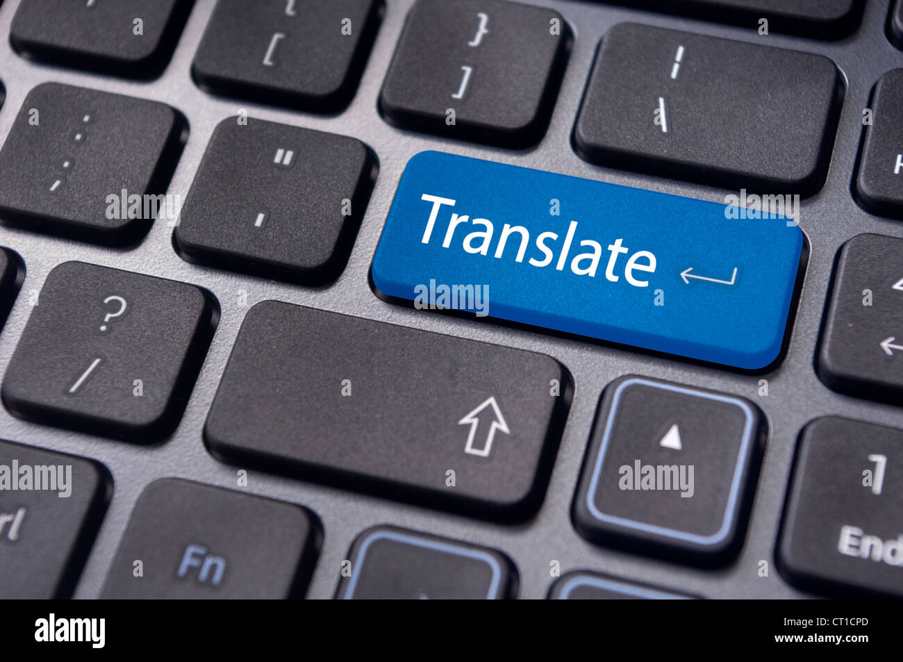 translate button on computer keyboard, translation of languages Stock Photo  - Alamy