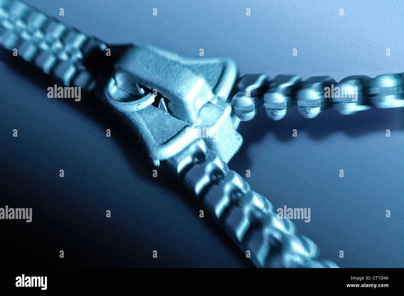 zipper half closed as a synonym for integration Stock Photo
