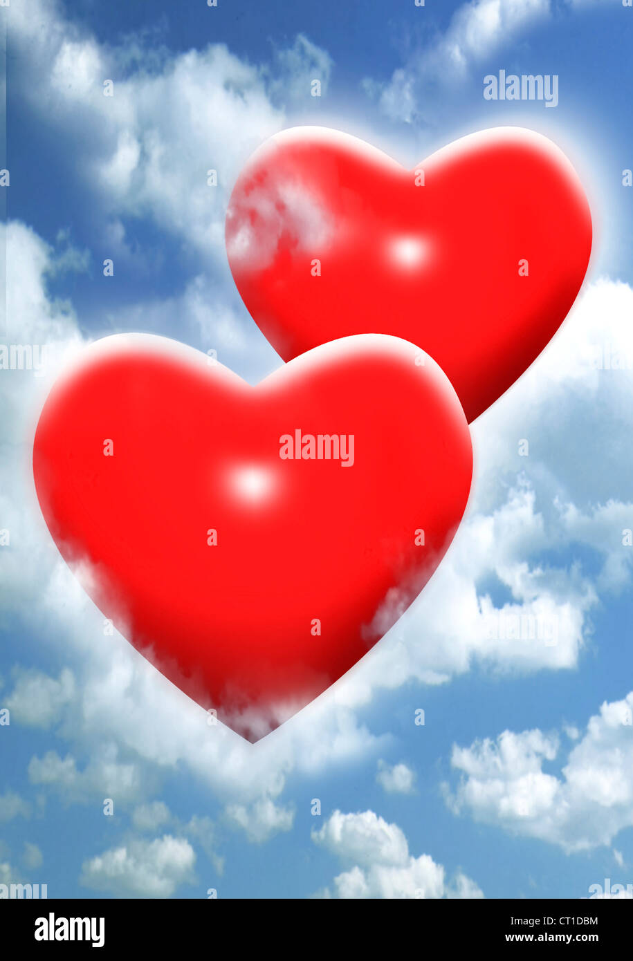 2 red hearts in the sky Stock Photo