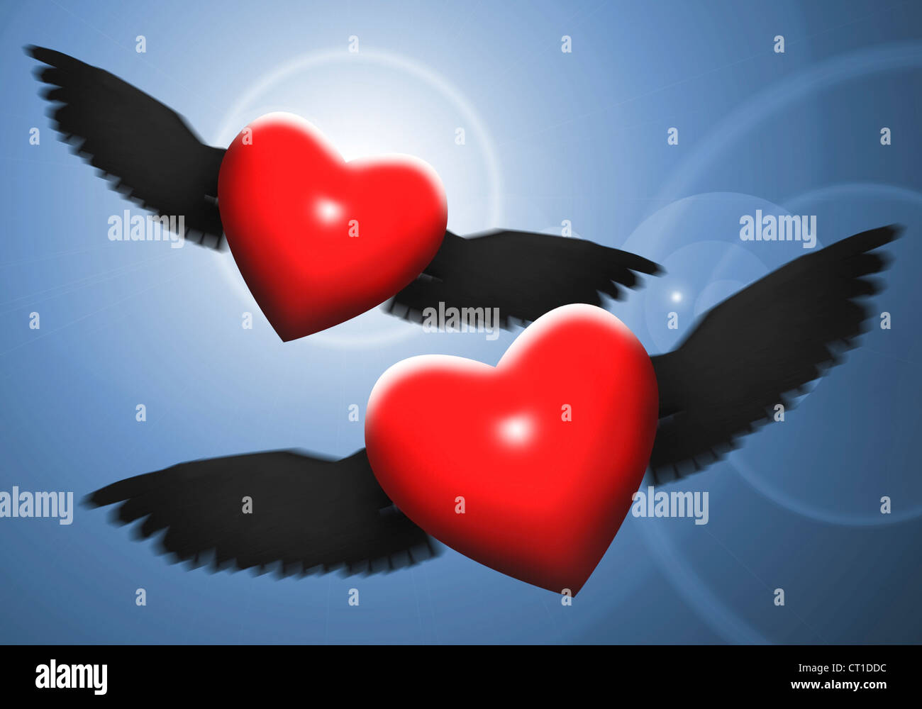 2 red hearts with wings in the night sky Stock Photo