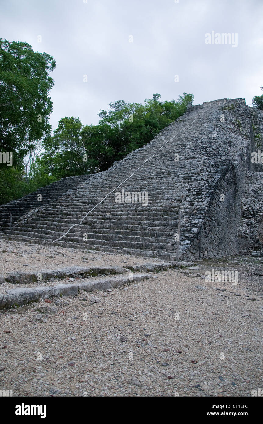 Coba's Nohoch Mul pyramid is one of the landmark ruins in Yucatan Mexico's Riviera Maya region. Stock Photo