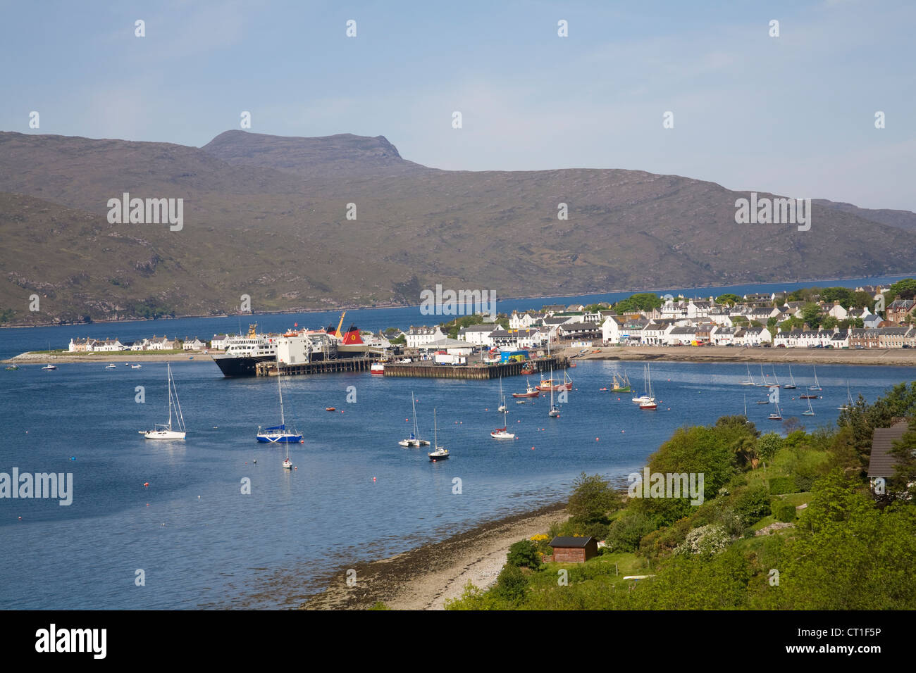 Ullapool Ross and Cromarty Scotland May View down to this small fishing and ferry port on Loch Broom from viewpoint above village Stock Photo