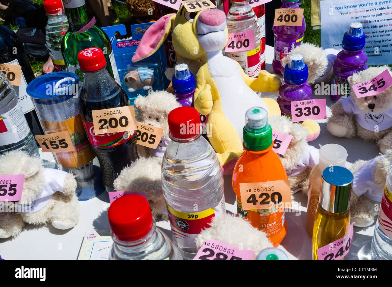 small items being offered as prizes in a village fete raffle tombola, UK Stock Photo